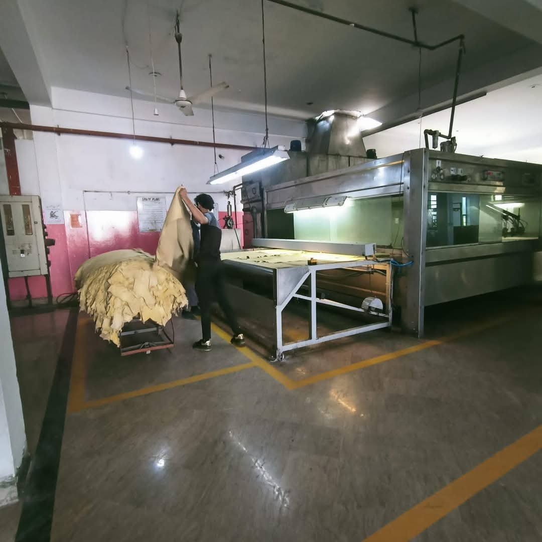 Leather processing machine inside factory