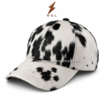 Cowhide leather baseball cap wholesale front view with black and white spotted hair-on hide,