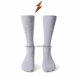 Grey Oktoberfest knee socks with cable-knit pattern, ribbed cuff and traditional lederhosen styling