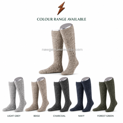 Beige Bavarian knee high socks with raised cable design, speckled knit yarn and clean white studio background