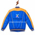 Best varsity jacket back view with large Konektor logo, orange shoulder yoke, blue body, striped hem, and panel piping