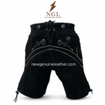 Black embroidered lederhosen shorts featuring suede texture, white floral embroidery, metal waistband buttons, curved pockets, and lace-tie sides