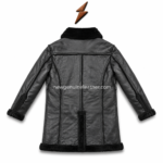 Back view of black fur lined leather coat with stitched leather panels, fur collar, sleeve seams