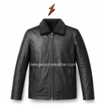 Back view of black leather jacket with vertical panel seams, sleeve zipper details