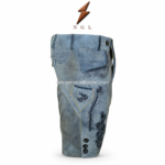 Blue grey embroidered lederhosen shorts featuring dark floral embroidery, gold piping, curved side pockets, metal buttons, and suede texture