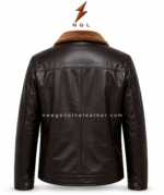 Brown shearling jacket shown open with soft black lining, front zipper, tan collar, and dark leather panel stitching.
