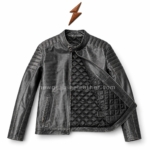 Distressed vintage black cafe racer leather jacket featuring quilted shoulder panels, snap-tab collar, and heavy-duty front zip closure