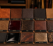 Different leather finishing types including aniline, semi-aniline, pigmented, nubuck, suede, patent, wax, oil, embossed, matte, glossy, pull-up, metallic and printed leather at newgenuneleather.com