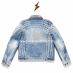 Men’s studded collar denim jacket shown open with soft inner lining, faded blue denim wash, metal buttons, and zip chest pockets.