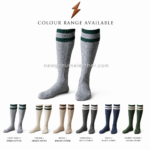 Green stripe lederhosen socks in grey cable-style knit with ribbed green and white cuff on white studio background