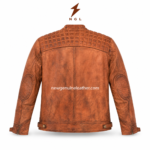 Rider leather jacket inner pose with open front zipper, black quilted lining, cognac brown leather shell, zipper cuffs