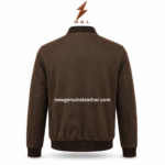 Product specs image of suede bomber jacket showing rib knit collar, front zip closure, soft inner lining, side welt pockets, and dark brown finish.