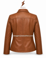Tan leather jacket detail showing stylish open collar, front zipper, shaped stitching, and premium brown leather grain.
