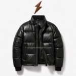 Back view of the best puffer jacket with uninterrupted horizontal quilting, black ribbed hem, and padded sleeves
