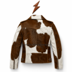 NGL hair-on cowhide jacket collar close-up with brown-and-white lapels, metal snaps, stitching, and NGL label