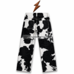 NEW GENUINE LEATHER Hair-on cowhide pants rear view with twin patch pockets, black and white panels, and V-shaped yoke